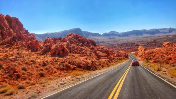 Mesquite Nevada Day Trips, valley-of-fire-state-park-nevada car on road driving through park